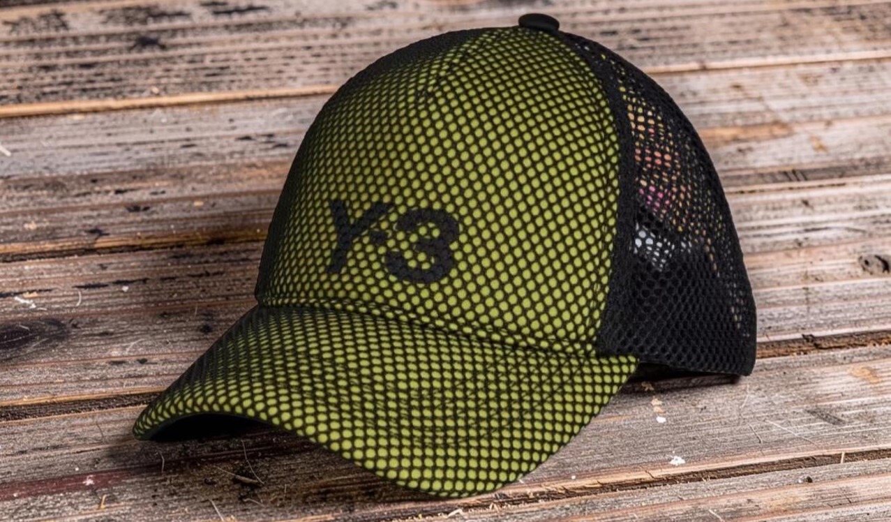 Y-3 Green Trucker Cap Y-3 Green Trucker Cap on wooden surface